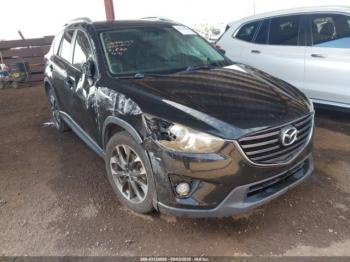  Salvage Mazda Cx