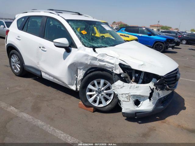  Salvage Mazda Cx